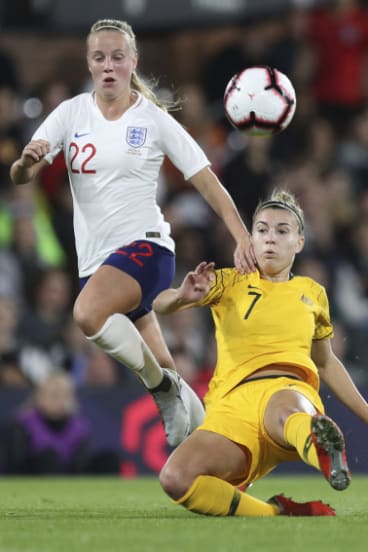 England 's Beth Mead evades Australia's Steph Catley.