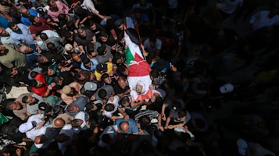 Mourners attend the funerals of Palestinians killed in recent Israeli air strikes on Sunday August 7, 2022 in Gaza City.