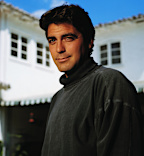 Actor George Clooney poses in grey turtleneck shirt. (Photo by  Tim Rue/CORBIS/Corbis via Getty Images)