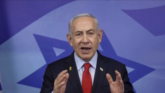 Benjamin Netanyahu makes a televised statement to the Israeli people on Tuesday.
