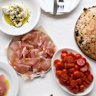 Totti’s puffy bread with a selection of sides.