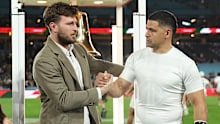 Jai Arrow with Cody Walker (right) and Adam Reynolds before kick-off.