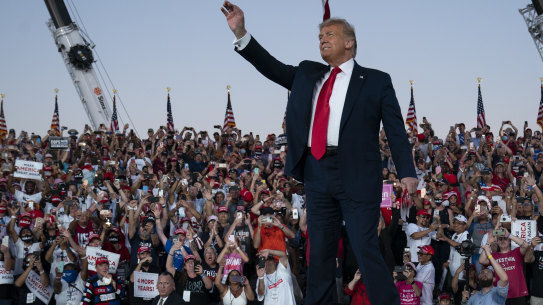 President Donald Trump arrives for a campaign rally at Orlando Sanford International Airport, Florida.