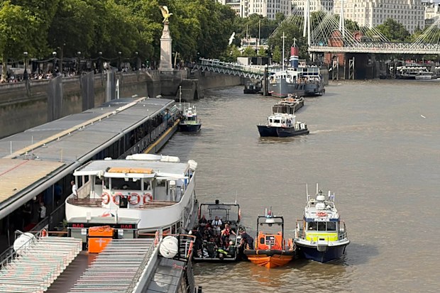 Emergency services attend an incident at Westminster Bridge in London, Friday July 24, 2026, after a police boat crashed into Westminster Bridge