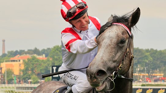 Kerrin McEvoy congratulates Classique Legend after winning The Everest last year.