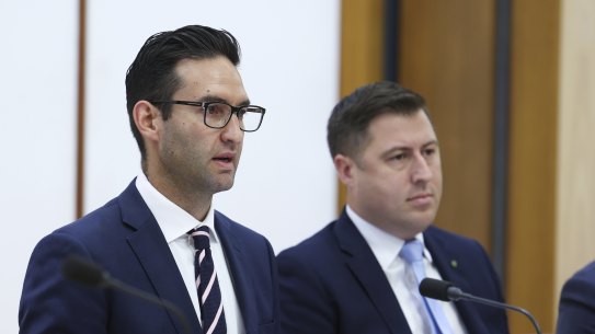 Chair Josh Burns and deputy chair Henry Pike during a hearing. 