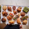 Pastries including pandan kaya croissant toast and mushroom rendang hand pie.