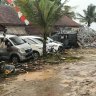 Locals begin to return to their homes as tsunami death toll rises