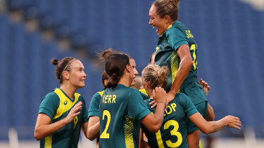The Matildas celebrate one of Sam Kerrâs two goals against Sweden.