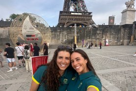 Jess and Noemie Fox in front of the Eiffel Twoer after Noemie qualified for her first Olympic Games.
