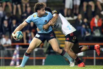 Mark Nawaqanitawase looks to pass the ball during NSW’s win over the Crusaders.