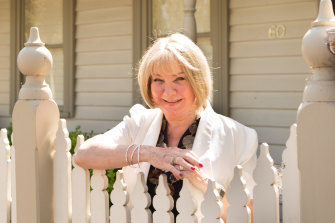 Gayle Roberts in front of her former home in Port Melbourne, which she sold before COVID-19 shut down Australia.