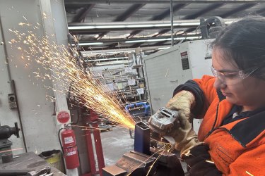 Two days a week, Lavena swaps schoolwork for metalwork