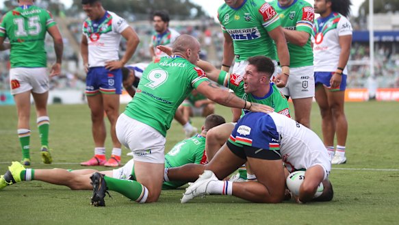 Josh Hodgson and Tom Starling celebrate a try against the Warriors back in round three.
