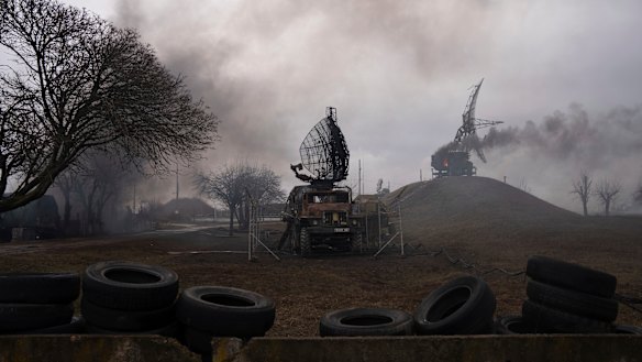 Smoke rises from an air defence base in the aftermath of an apparent Russian strike in Mariupol last Thursday. 