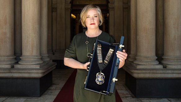 Outgoing deputy mayor Linda Scott will propose a motion to retire the "racist" chains from use.