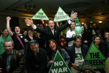 Then-Victorian Senate candidate David Risstrom and fellow party members celebrate the Greens' campaign in 2004.