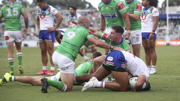 Josh Hodgson and Tom Starling celebrate a try against the Warriors back in round three.