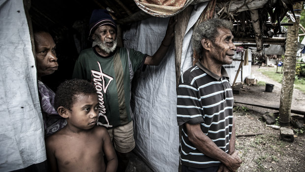 Evacuees living in a makeshift house at Kaiwo village, North Maewo, 