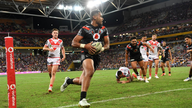 Stroll: David Fusitua canters over out wide.