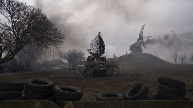 Smoke rises from an air defence base in the aftermath of an apparent Russian strike in Mariupol last Thursday. 