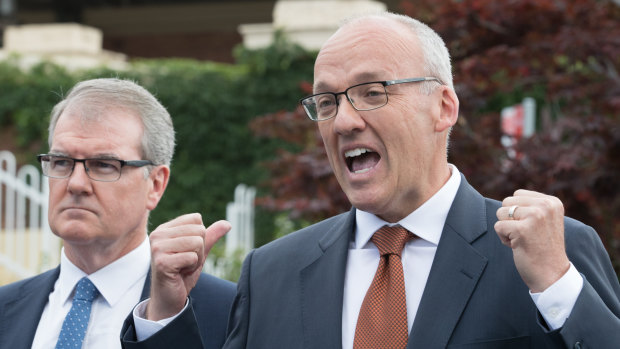 Luke Foley, flanked by Michael Daley, making a transport policy announcement on Thursday morning, before resigning in the evening.