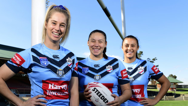 Under-18s Blues player Maddison Weatherall, centre, with senior stars Kezie Apps and Corban McGregor at North Sydney Oval before the women's Origin clash.