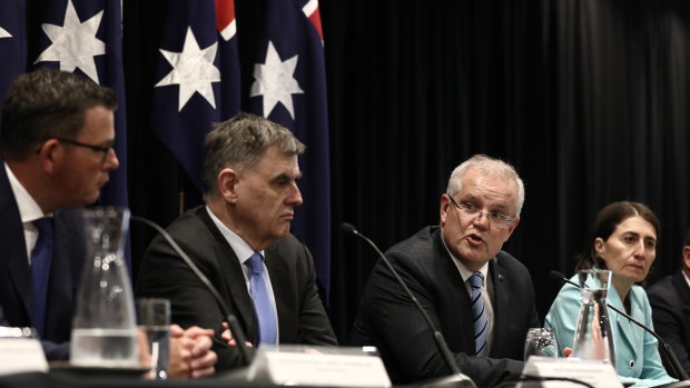 Prime Minister Scott Morrison addresses the media with Premiers and Chief Minister on March 13.