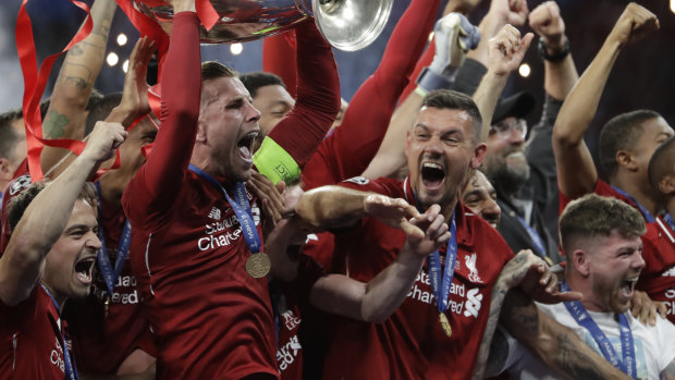 Six times: Liverpool captain Jordan Henderson with the Champions League trophy.