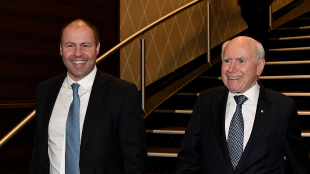 Treasurer Josh Frydenberg and former prime minister John Howard arrive at the Miramare Gardens dinner on Thursday.
