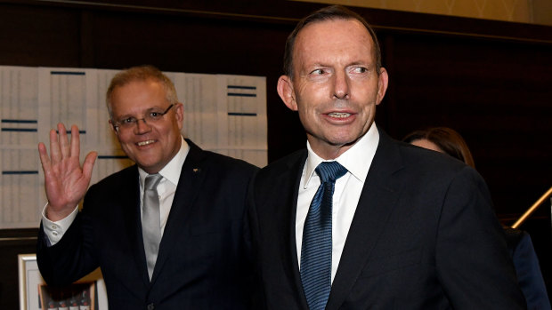 Prime Minister Scott Morrison and former prime minister Tony Abbott arrive at Mr Abbott's tribute dinner.