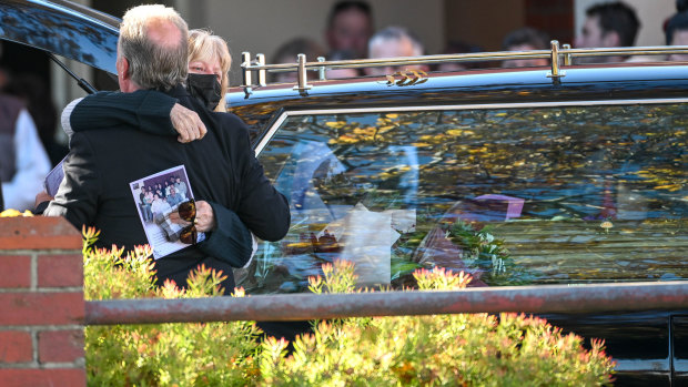 Mourners in purple remember ‘beautiful soul’ who suffered incomprehensible loss