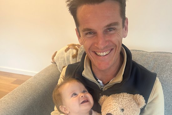 Lewis Rankin with baby Rosie, who was born a year after his firstborn, Poppy, was lost to stillbirth.