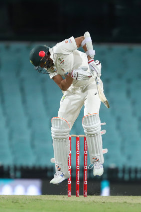 Harry Conway is struck by a short ball at the SCG on Friday night.