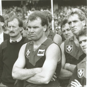 Melbourne coach John Northey and players after the 1988 grand final.