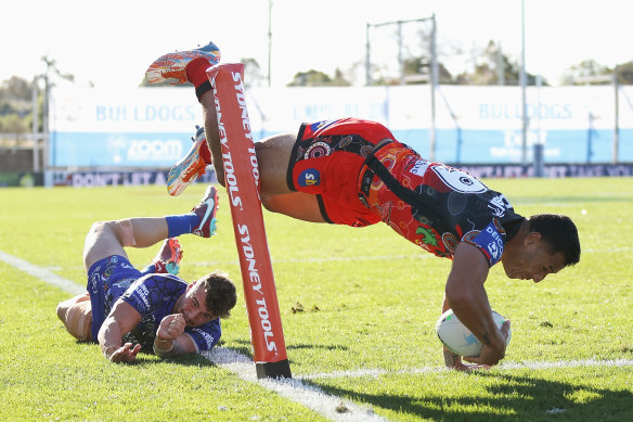 Tautau Moga dots down for the Dragons against Canterbury at Belmore.