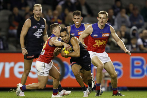 Eddie Betts is tackled by Dayne Zorko of the Lions on Saturday.