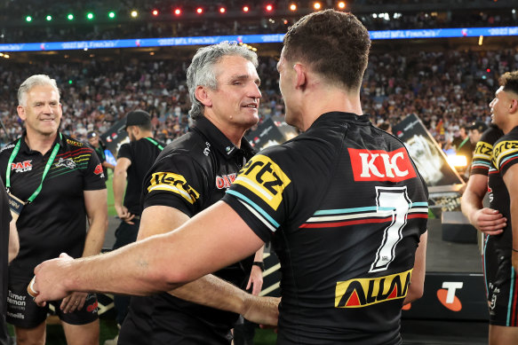 Nathan Cleary celebrates with his father and coach Ivan Cleary.