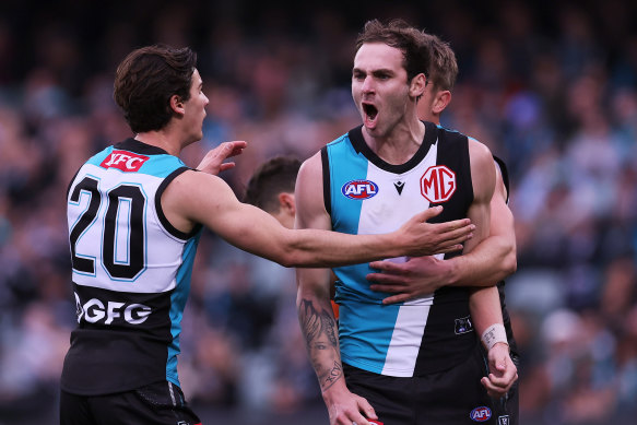 Port Adelaide’s Jeremy Finlayson celebrates a goal in a game last year.