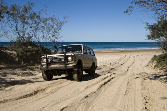 A four-wheel-drive on Queensland’s Fraser Island.