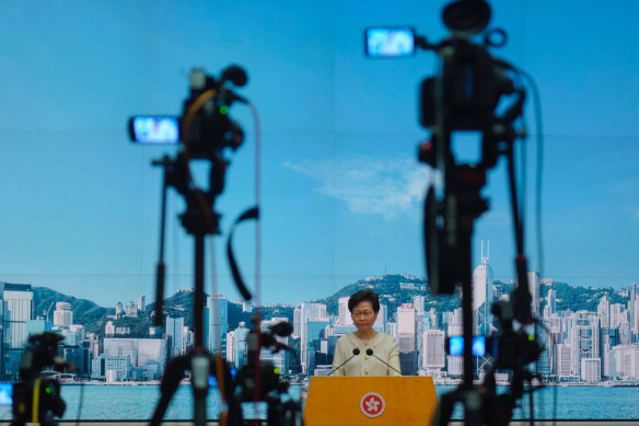 'Not doom and gloom': Hong Kong Chief Executive Carrie Lam holds a press conference in Hong Kong on Tuesday.