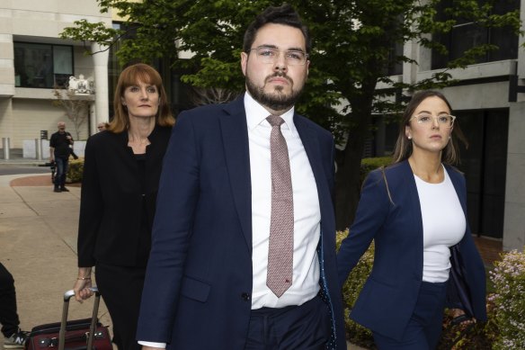 Bruce Lehrmann (centre) departs court on Tuesday.