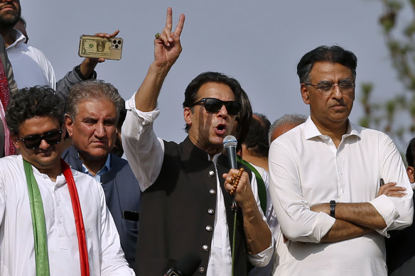 Pakistan’s defiant former prime minister Imran Khan, centre, addresses an anti-government rallyin Islamabad.