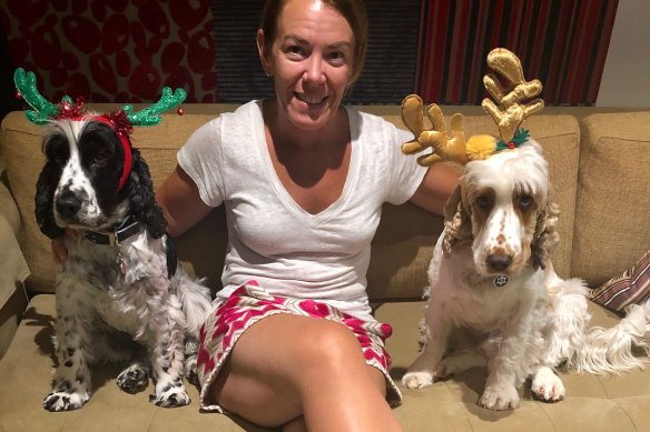 Melissa Caddick pictured with her dogs.