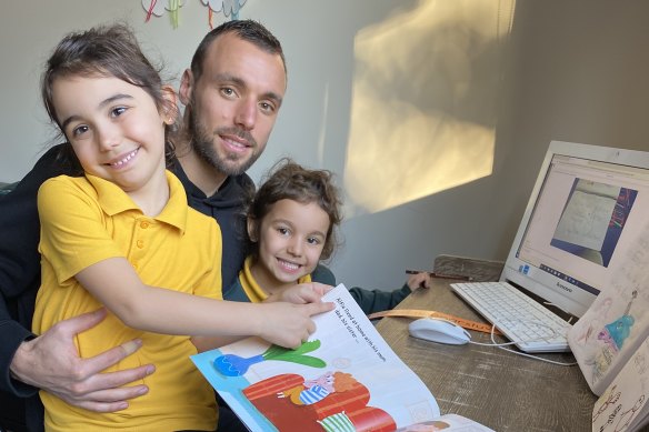 Melbourne City's Florin Berenguer with his daughters Chlea and Leana.