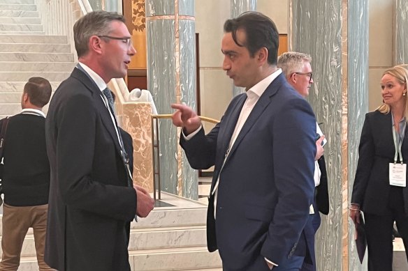 RTBU national secretary Mark Diamond speaks with NSW Premier Dominic Perrottet in Parliament House on Thursday.