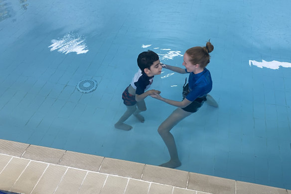 Alicio’s condition hasn’t held him back from swimming lessons.