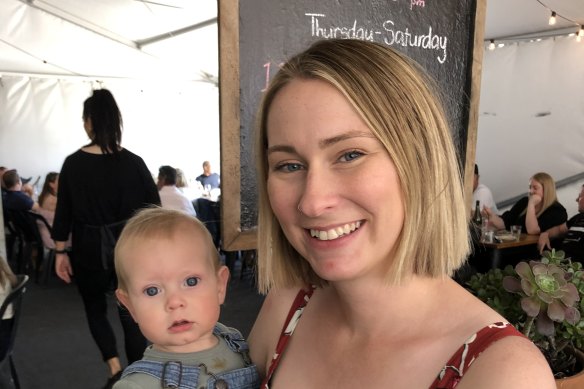 Midwife Marnie Icim, 29, (pictured with son Alexander) has contemplated leaving the profession.