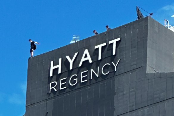 Dangerous skylarking on the roof of the Hyatt Regency in Brisbane.