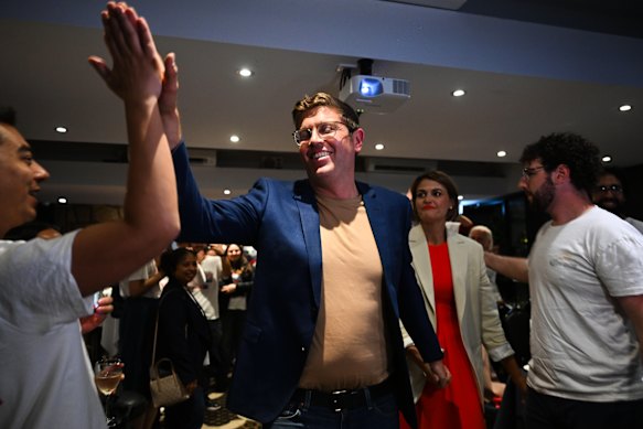 Labor’s Jerome Laxale celebrates his Bennelong election victory. 